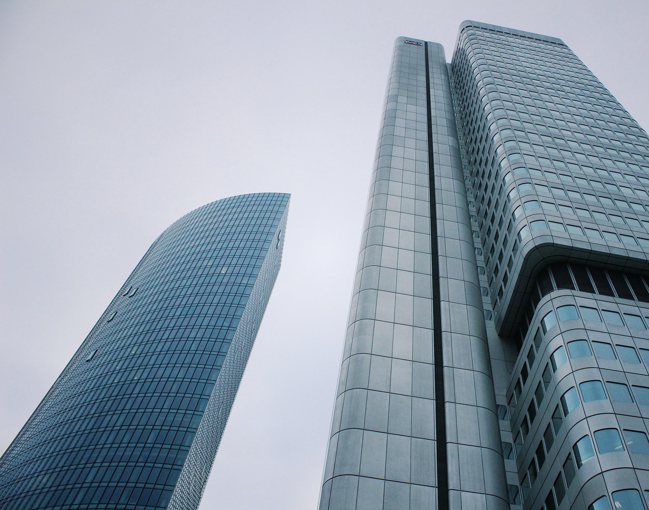 Skyscraper, corporate, modern buildings — "Join Our Team: Seeking Enthusiastic Part-Time Karaoke Assistants"